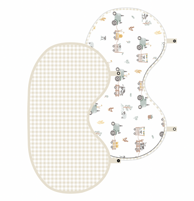 2-pack of contoured baby burp cloths in Tractor Ride style, featuring one cloth with a neutral beige grid pattern and another with an illustrated green tractor and farm animal print.
