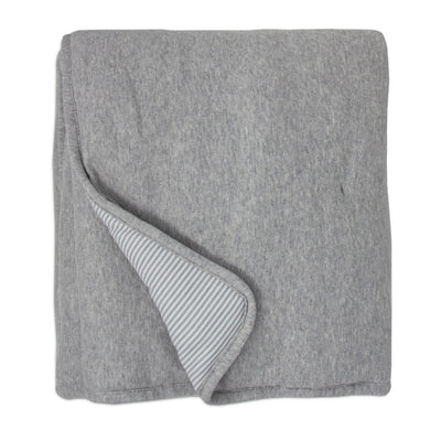 Front studio shot of the folded baby quilted comforter blanket in a textured grey marl fabric, with one corner turned back to showcase the reversible side featuring thin grey heathered stripes.