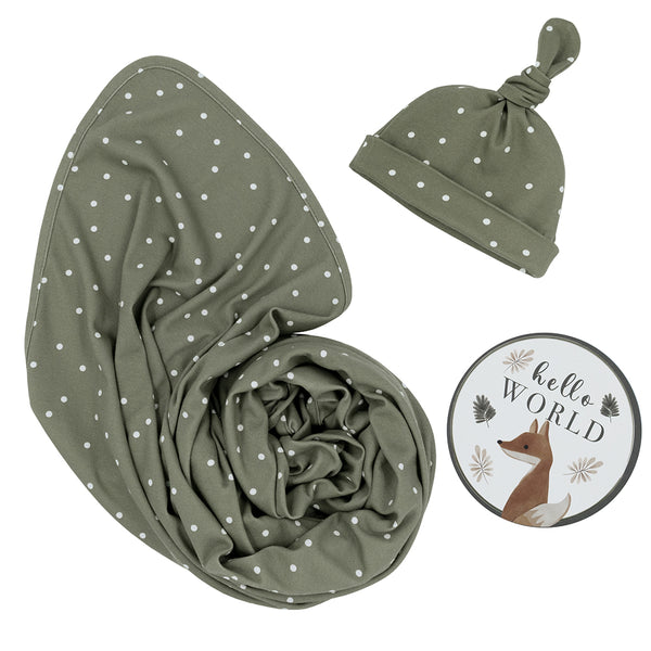 Hello World 3-piece newborn gift set in Olive Spots style, featuring a soft olive green jersey cotton swaddle blanket, a matching printed top-knot baby beanie, and a round fox-illustrated "Hello World" milestone announcement disc.