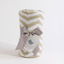Rolled Taupe Chevron Knitted Chenille Blanket wrapped nicely with a gray satin ribbon and a heart gift tag.