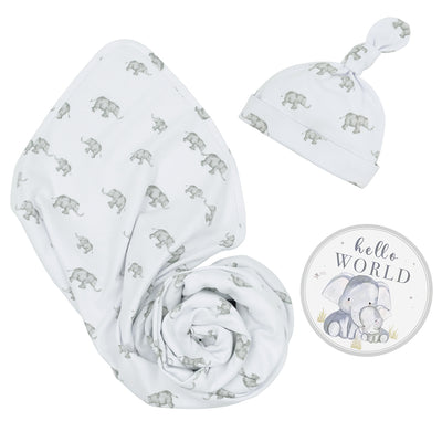 Hello World 3-piece newborn gift set in Elephant Heritage style, featuring a white jersey cotton swaddle blanket and matching knotted baby beanie with a grey elephant pattern, alongside a round 